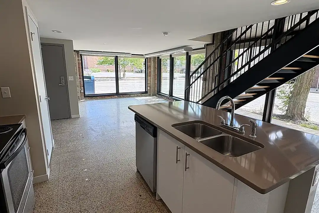 Kitchen and stair to mezzanine