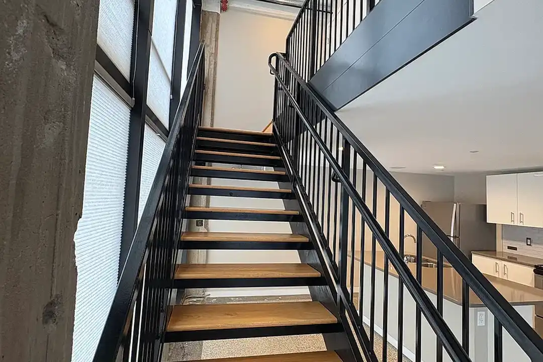 Stair up to mezzanine bedroom
